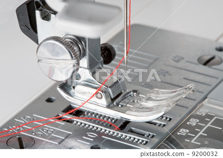 thread in needle of sewing machine 9200032