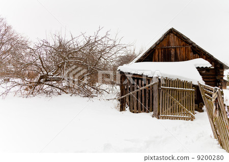 abandoned wooden shed in snow-covered village abandoned wooden shed in snow-covered village 9200280