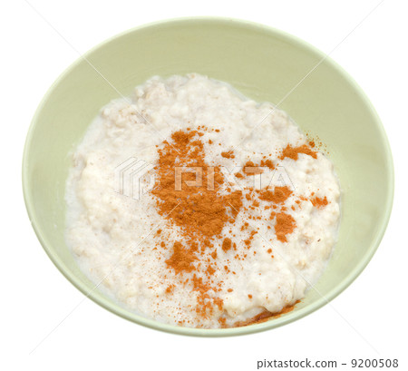 oat porridge with cinnamon in yellow bow 9200508