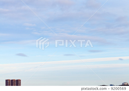 spring sky under urban houses 9200569