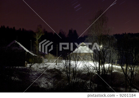 rustic house under snow at night rustic house under snow at night 9201184