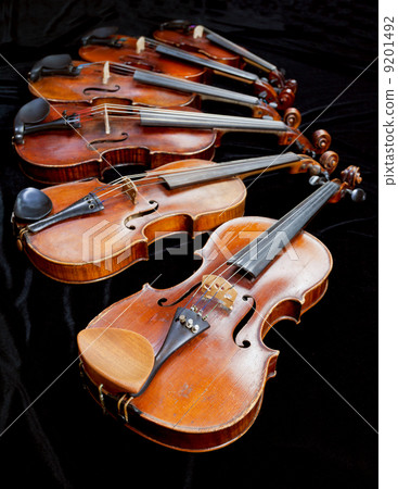 violins with black background violins with black background 9201492