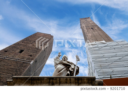 The towers and the statue under blue sky in Bologna 9201710