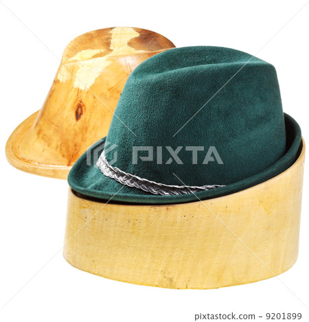 green felt hat on linden wooden block green felt hat on linden wooden block 9201899