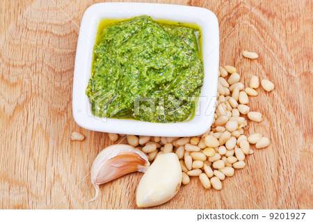 italian pesto with nuts and garlic on wooden board 9201927