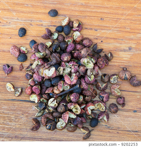 Sichuan pepper on wooden board Sichuan pepper on wooden board 9202253