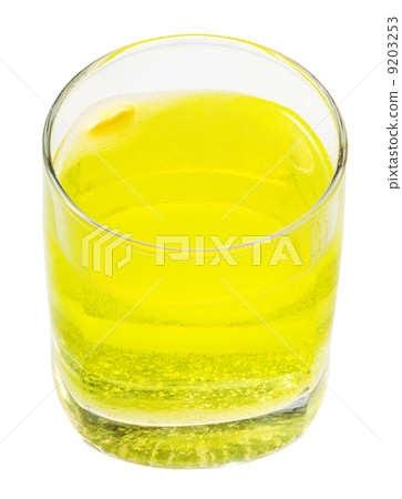 glass of yellow carbonated water with vitamin C 9203253