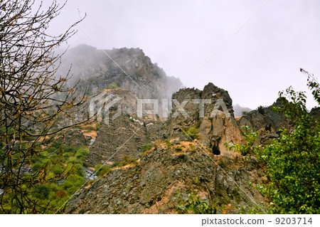 cliff with cave near Geghard monastery, Armenia cliff with cave near Geghard monastery, Armenia 9203714