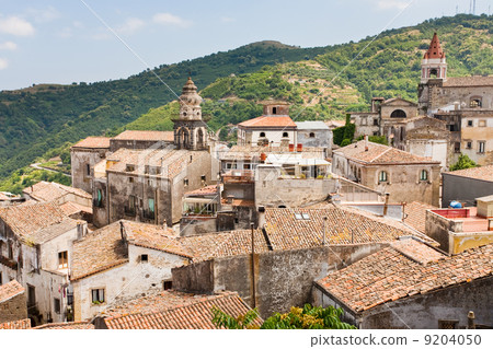 view on ancient tile roofs and tower of Sant Antonio church in Castiglione di Sicilia view on ancient tile roofs and tower of Sant Antonio church in Castiglione di Sicilia 9204050