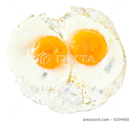 top view of two fry eggs on white top view of two fry eggs on white 9204668