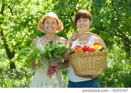 Two happy women with vegetables Two happy women with vegetables 9205347