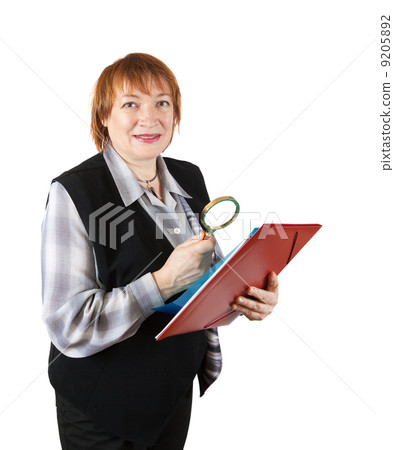senior businesswoman reading through lens 9205892