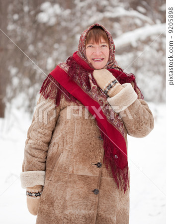 mature woman wearing kerchief 9205898