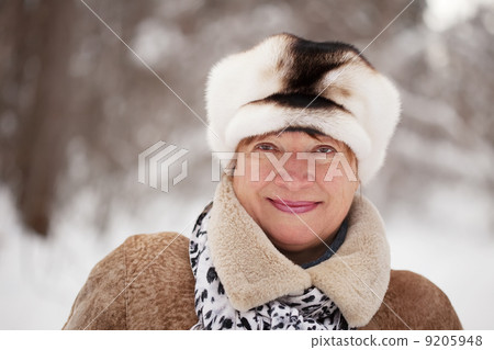 portrait of mature woman in winter portrait of mature woman in winter 9205948