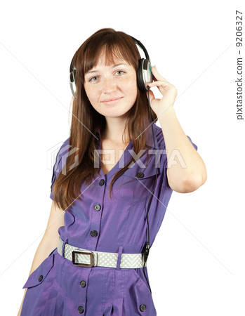girl listening music in headphones 9206327