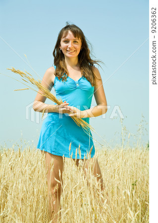 Girl with wheat ears 9206362