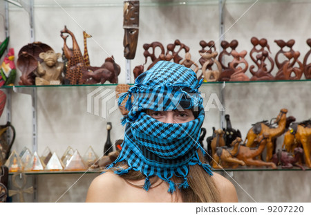 woman in egyptian souvenirs shop woman in egyptian souvenirs shop 9207220