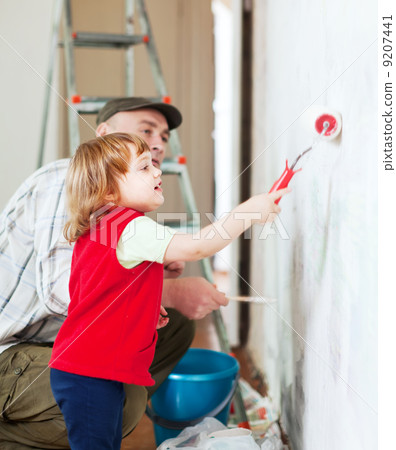 child with father paints wall child with father paints wall 9207441