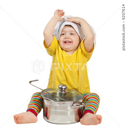 Baby cook in toque with pan. Isolated over white 9207614