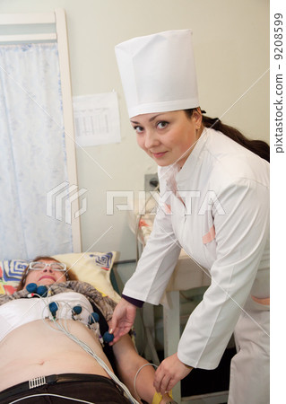 Medical doctor making ECG Medical doctor making ECG 9208599