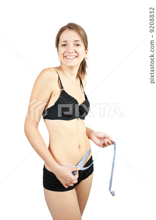 Girl measuring waist Girl measuring waist 9208832