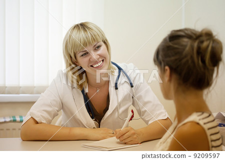 doctor listening the patient doctor listening the patient 9209597
