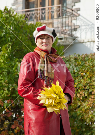 Outdoor portrait of mature woman Outdoor portrait of mature woman 9209800
