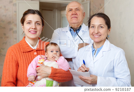 doctors and mother with newborn baby 9210187