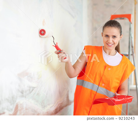 painter paints wall with roller painter paints wall with roller 9210243