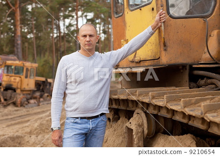 Tractor operator at workplace Tractor operator at workplace 9210654