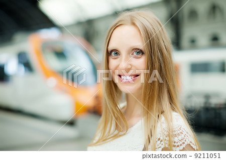 Woman waiting train 9211051