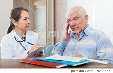doctor examining the senior patient doctor examining the senior patient 9211343