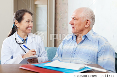 man complaining to doctor about feels man complaining to doctor about feels 9211344