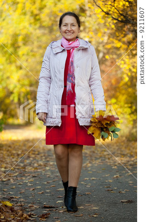 walking mature woman walking mature woman 9211607