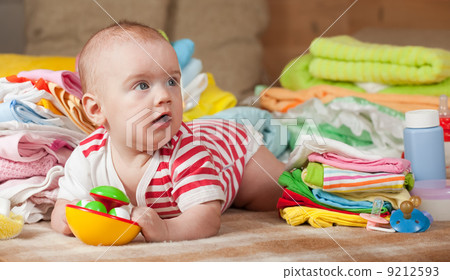 baby girl with baby's things baby girl with baby's things 9212593