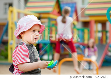 toddler in playground 9212610