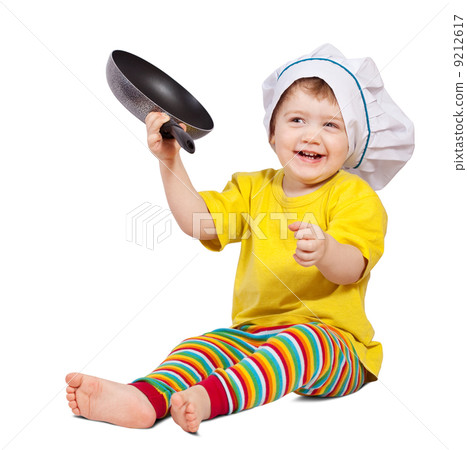 Baby cook with griddle. Isolated over white Baby cook with griddle. Isolated over white 9212617