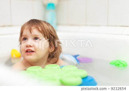 two-year girl bathes in bath two-year girl bathes in bath 9212654