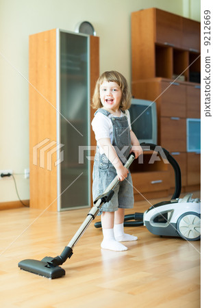 2 years girl with vacuum cleaner 2 years girl with vacuum cleaner 9212669