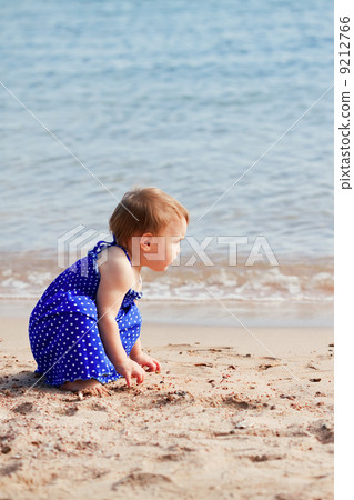 girl on sand beach 9212766