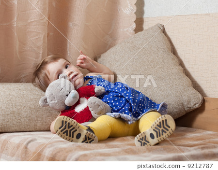 Baby girl with toy 9212787