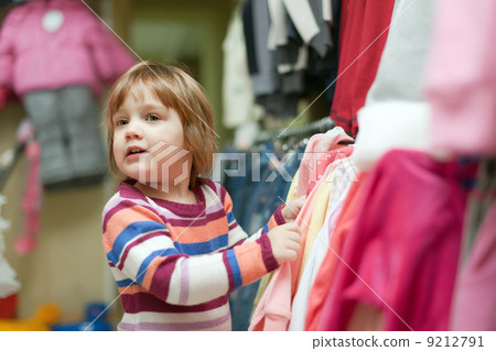 Baby girl in fashionable shop Baby girl in fashionable shop 9212791