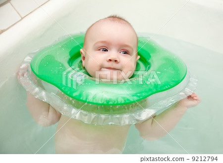 baby swimming with neck swim ring baby swimming with neck swim ring 9212794