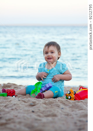 Toddler on sand beach Toddler on sand beach 9212795