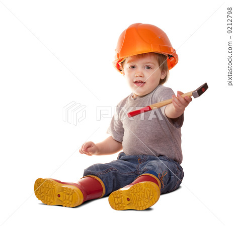 Toddler in hardhat with hammer. Isolated over white Toddler in hardhat with hammer. Isolated over white 9212798