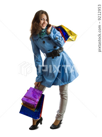 Girl holding shopping bags Girl holding shopping bags 9212953