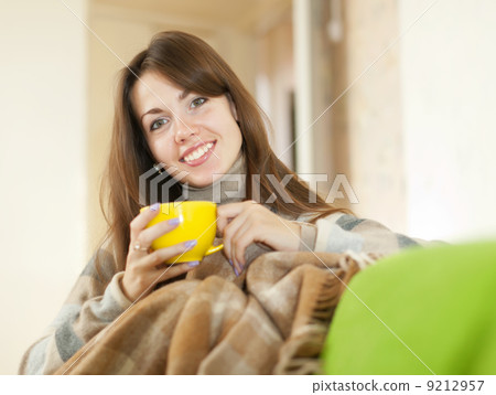 Girl with cup of tea Girl with cup of tea 9212957