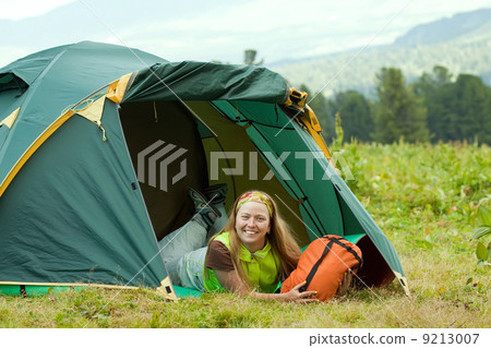 Happy female tourist Happy female tourist 9213007