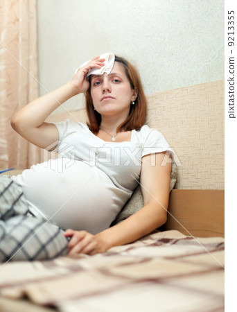 Suffering pregnant woman 9213355