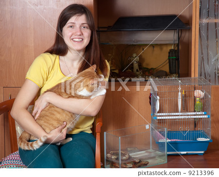 Happy woman with pets 9213396